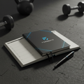 ForgeFit Workout Journal - premium black hardcover with electric blue accents